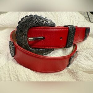 Title:
Vintage Ginnie Johansen Red Leather Western Belt w/ Ornate Silver Buckle